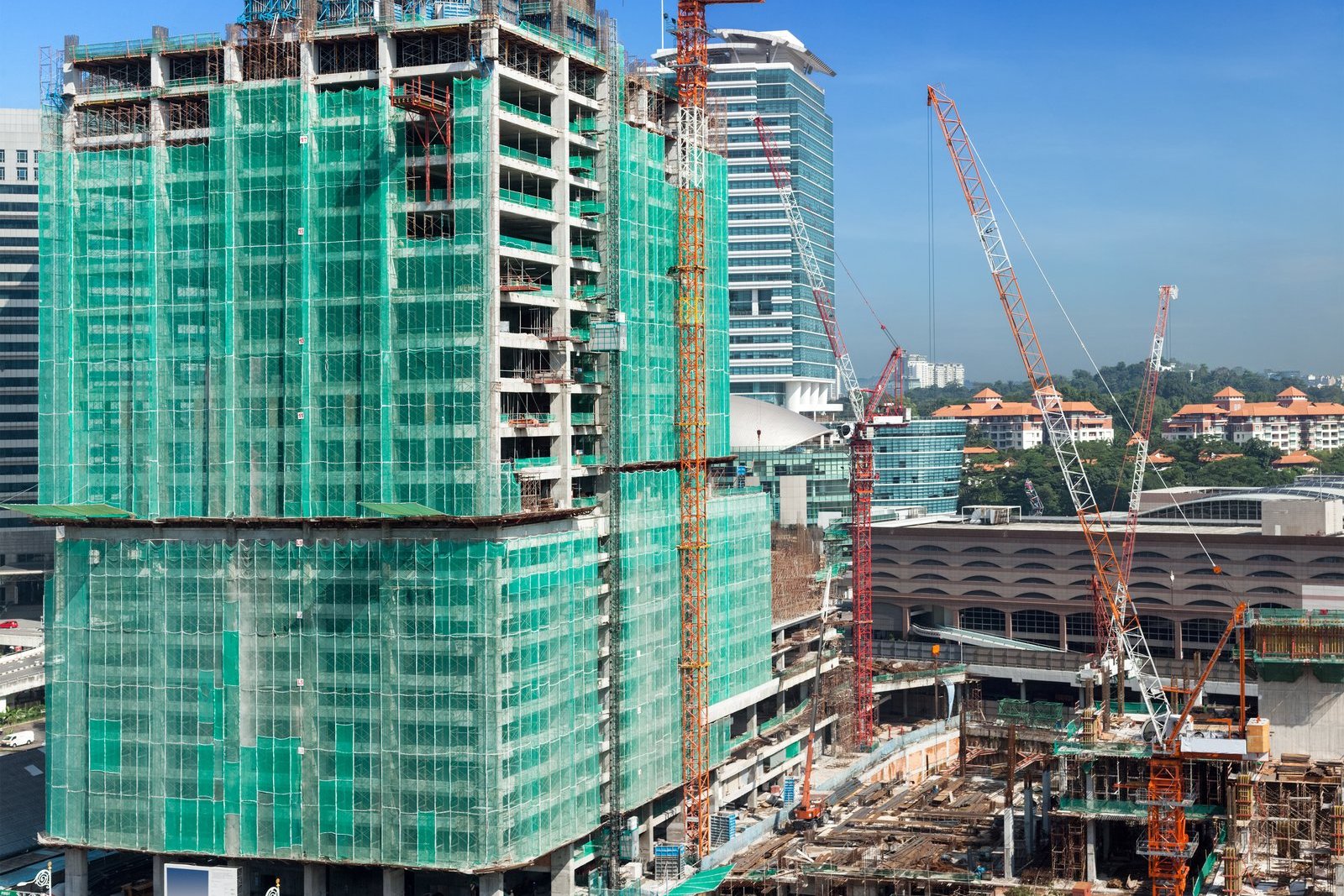 High-rise building under construction, one of the sectors subject to Singapore's Dependency Ratio Ceiling